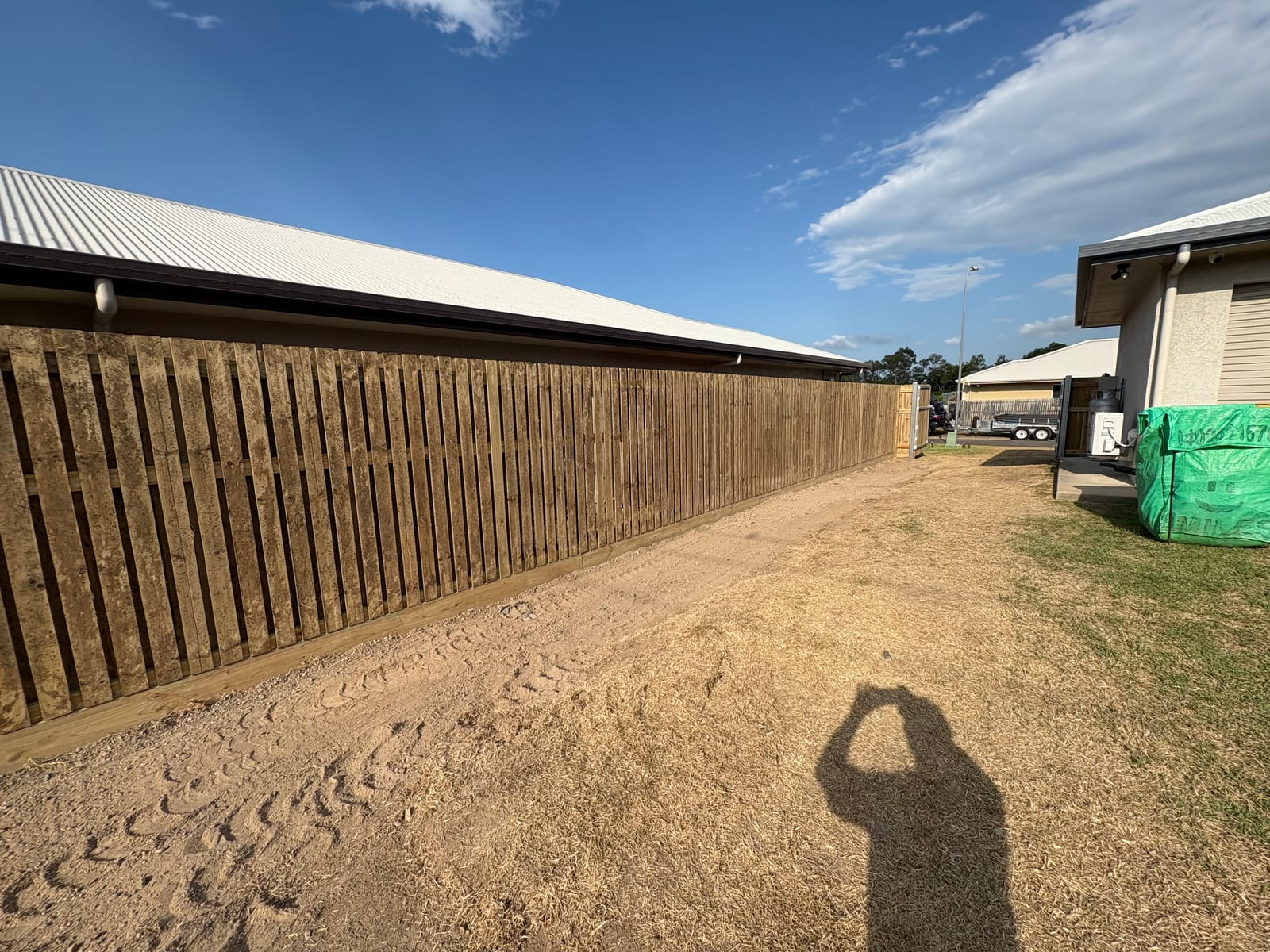 Long timber boundary fence in Townsville