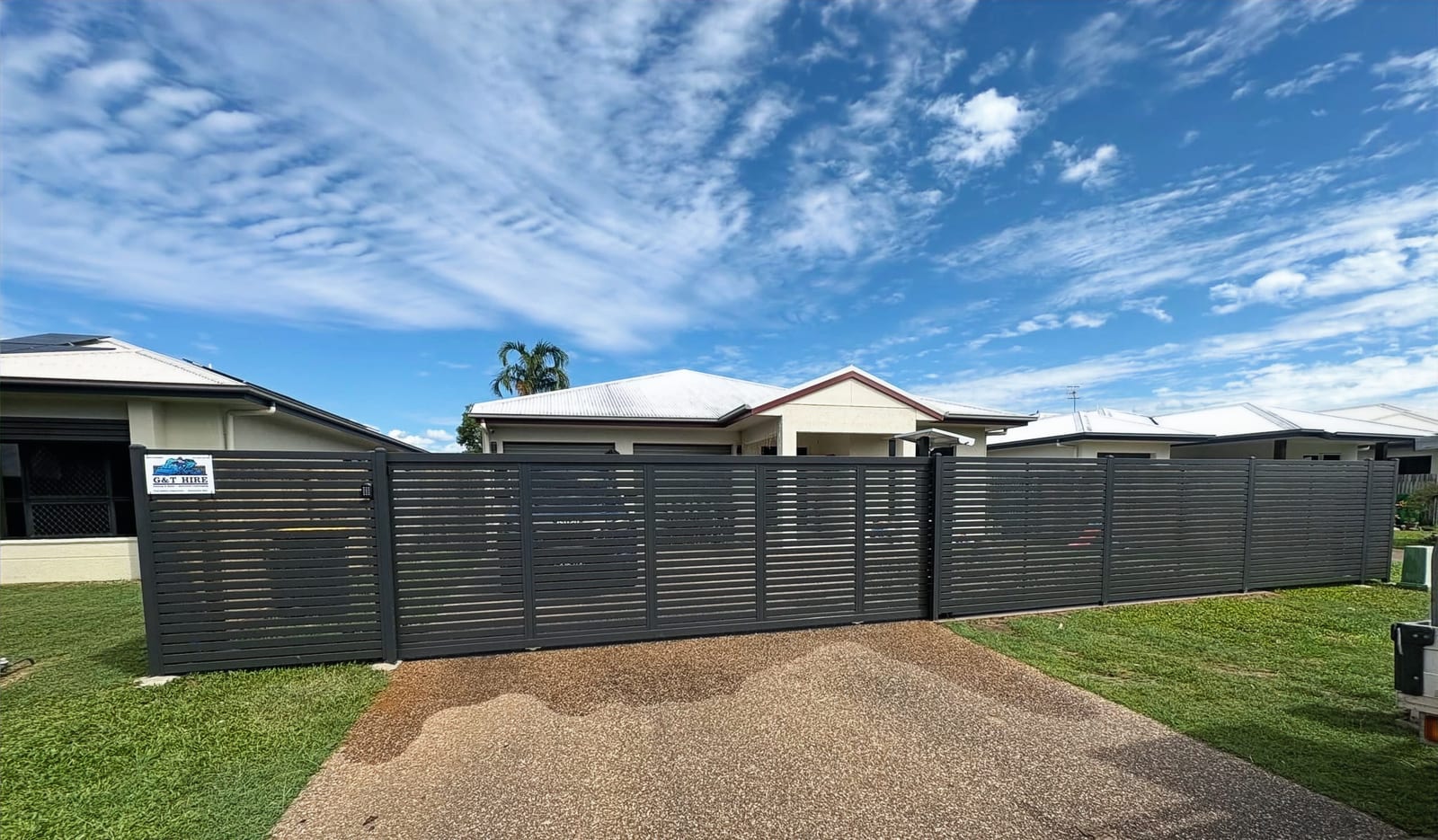Aluminium slat fence at the front of a Townsville home