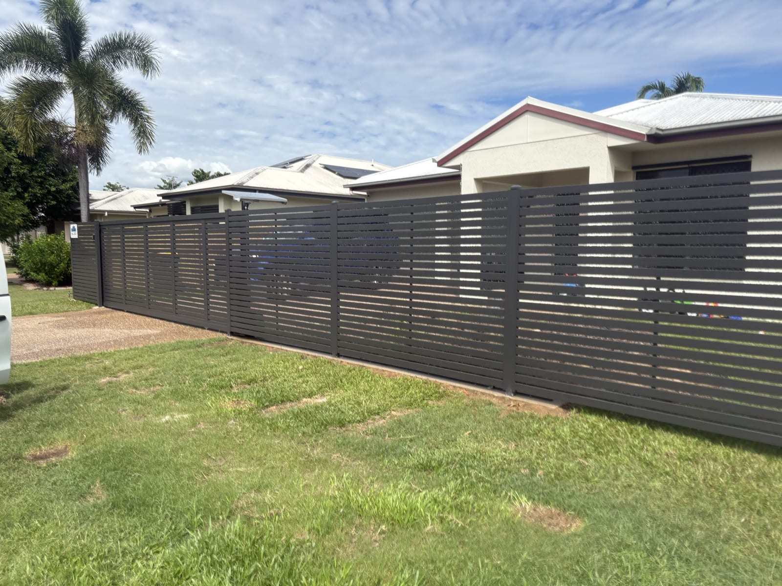 Aluminium slat fence and gates on a Townsville street front