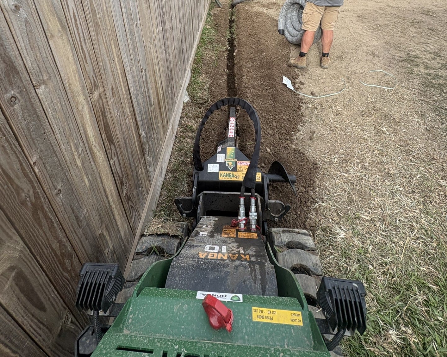 Kanga tracked mini loader trenching in Townsville — G & T Hire equipment hire