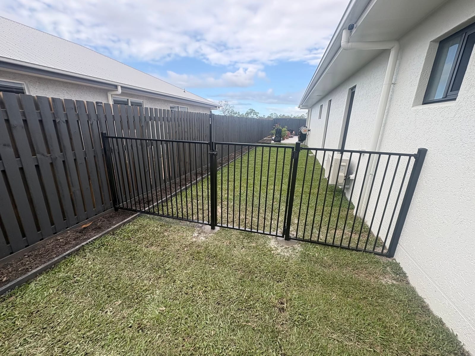 Black aluminium pool gate and fencing, Townsville