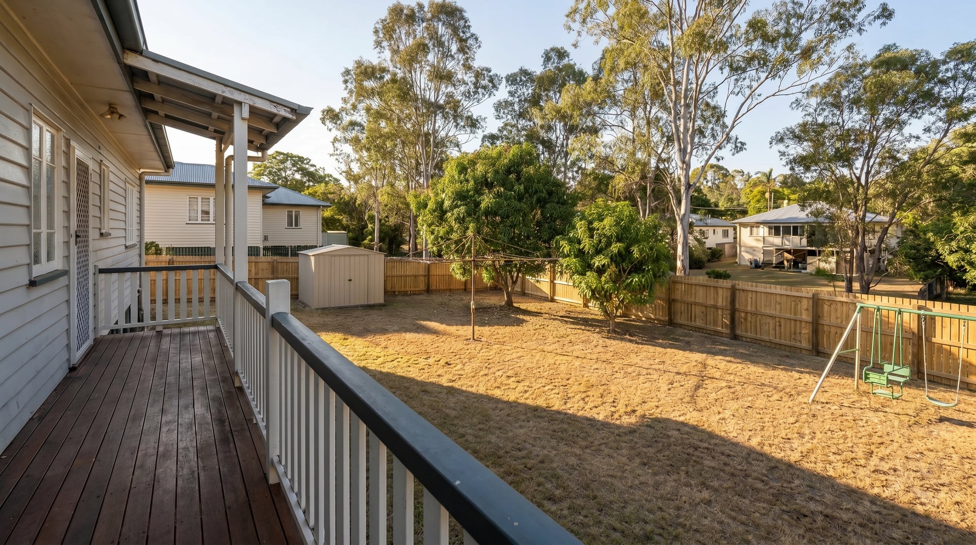 The same Townsville backyard after G & T Hire built a timber boundary fence